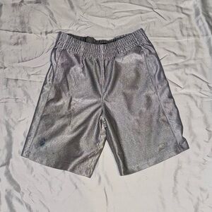 Boys pull on basketball shorts